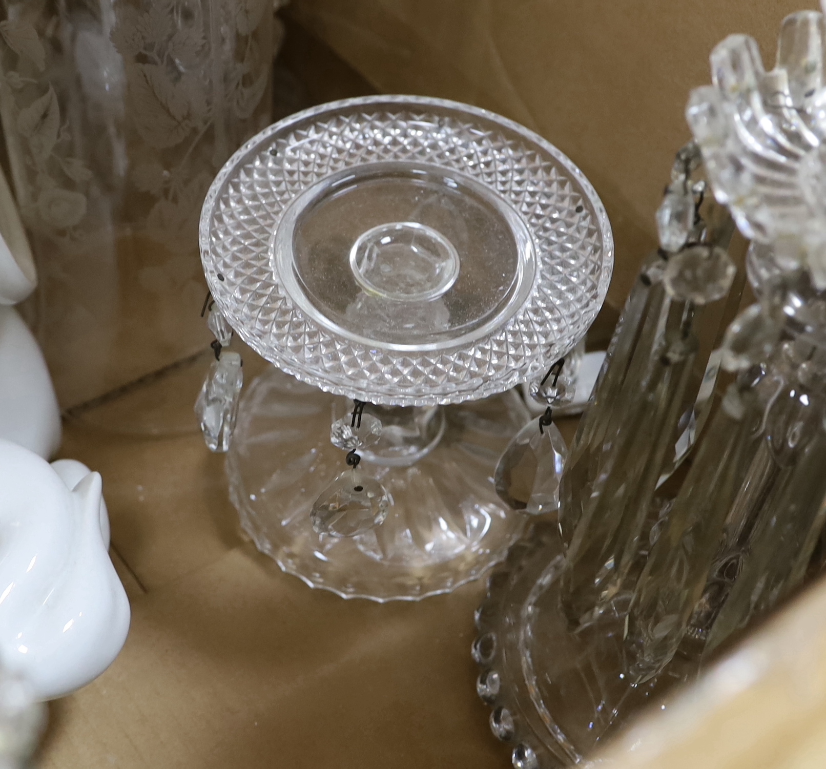 Two pairs of glass lustres, a larger lustre, other glassware, a pair of pottery candle sticks and ornamental cats